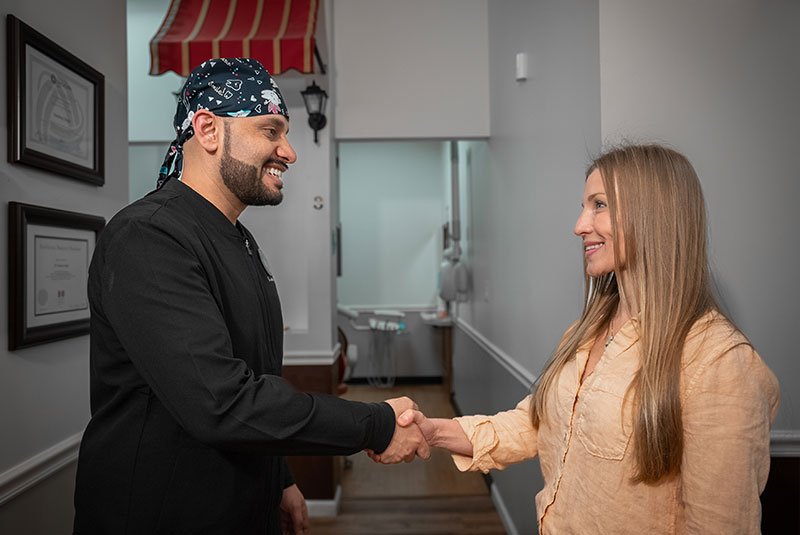 doctor and patient smiling brightly