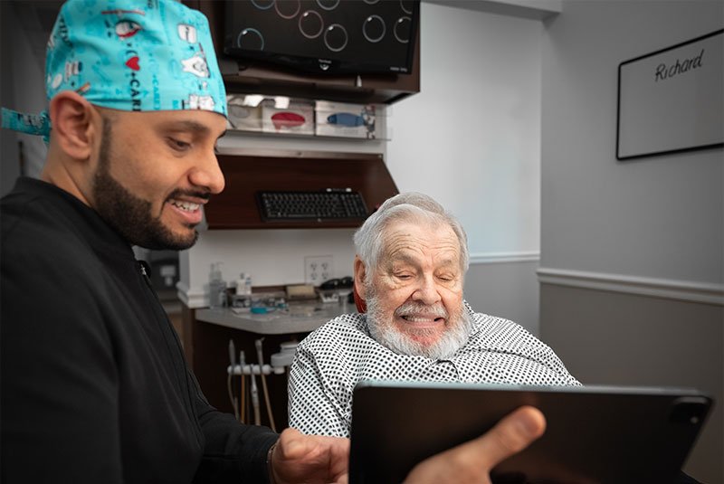 doctor Surdeep Singh showing patient dental information