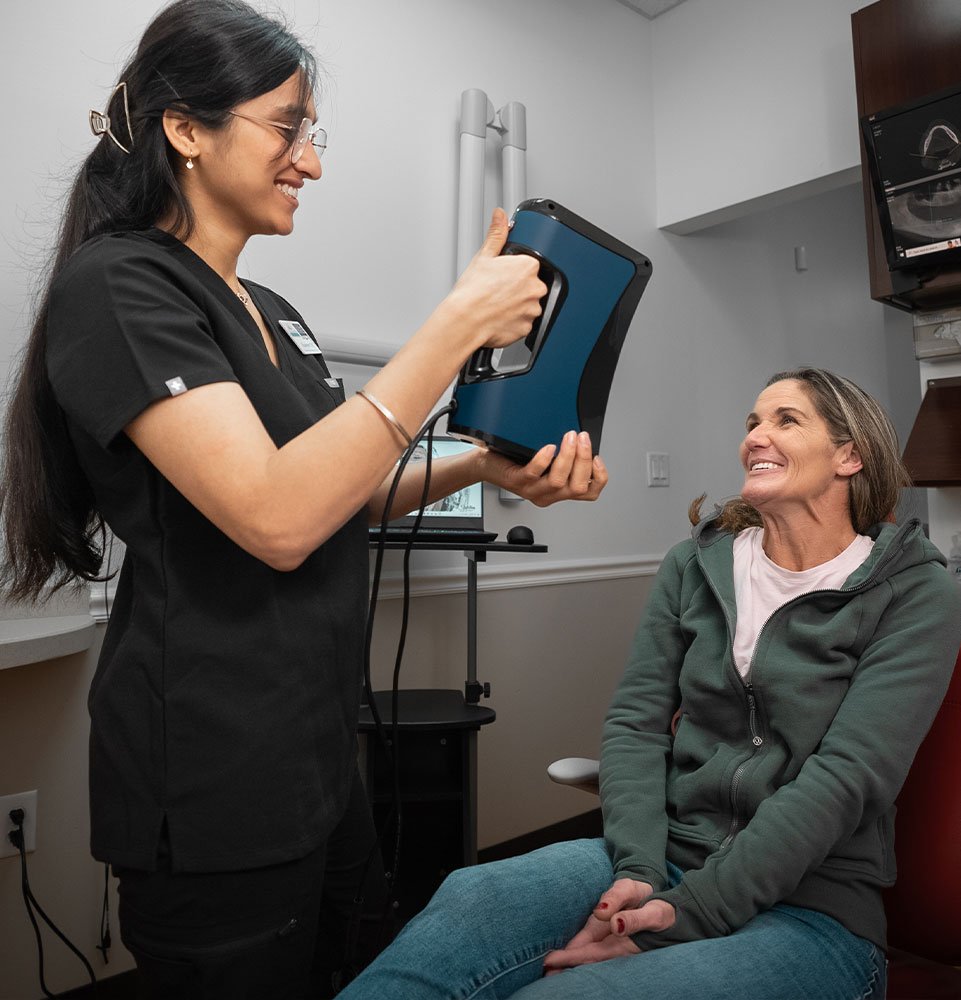 patient having a facial scanner for dental treatment