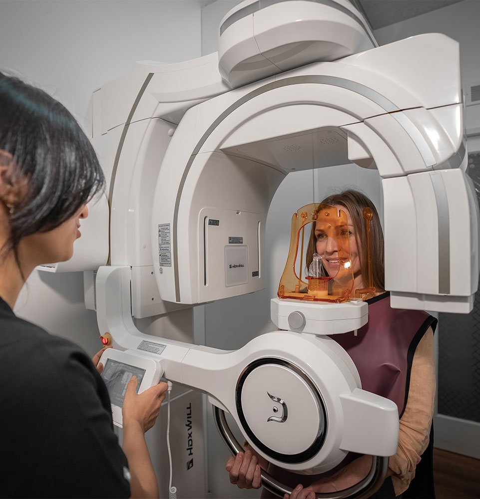 patient undergoing cbct scan for dental procedure